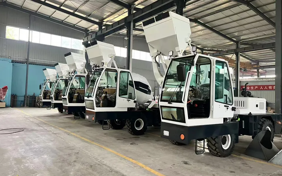 Row of Ray Bridge self-loading concrete mixers